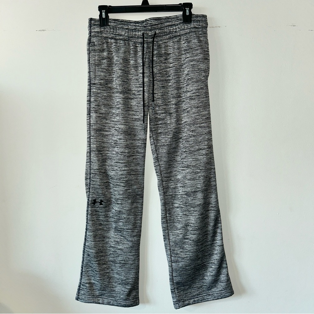 Under Armour heathered gray storm sweats with pockets.